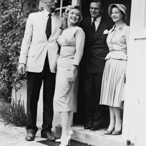 A print of Marilyn Monroe, Arthur Miller, Laurence Olivier and Vivien Leigh A print of Marilyn Monroe, Arthur Miller, Laurence Olivier and Vivien Leigh