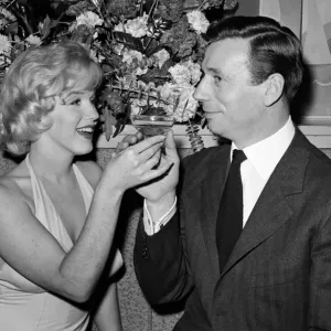 Marilyn Monroe and her co-star, French actor and singer Yves Montand Marilyn Monroe and her co-star, French actor and singer Yves Montand