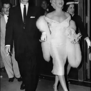 Print of Marilyn Monroe and Joe DiMaggio, 1950s Print of Marilyn Monroe and Joe DiMaggio, 1950s