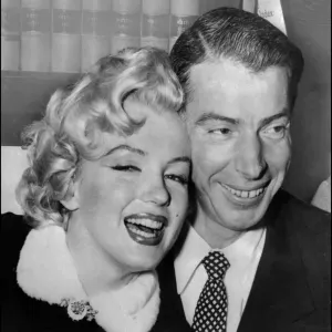 Marilyn Monroe with Joe DiMaggio during their wedding ceremony Marilyn Monroe with Joe DiMaggio during their wedding ceremony