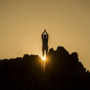 Print of a girl in yoga pose on Ancient Observatory Kokino
