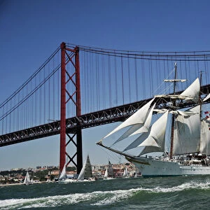 Sailing boat Juan Sebastian De Elcano sails at the Tejo River in Lisbon on July 22