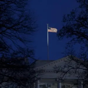 Print of the US flag flying over the White House Print of the US flag flying over the White House