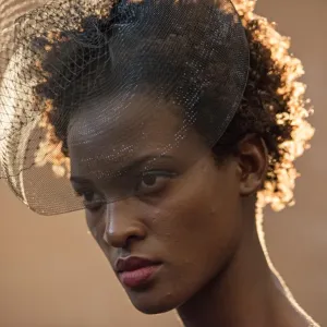 Print of a model waiting backstage at Swahili Fashion Week in Tanzania