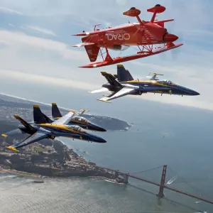 Team Oracle stunt pilot Sean Tucker (above) flies near the Golden Gate Bridge along with three U