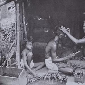 A Ceylon Shave, the Hindoo caste have the head shaved in curious shapes, such as that seen on the barber (b / w photo)