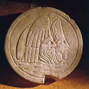 Oscillum depicting theatrical masks (stone)