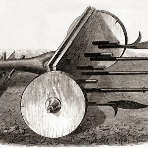 A Ribauldequin, infernal machine or organ gun, armed with small cannon and pikes