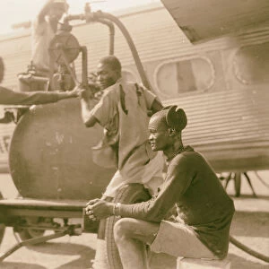 Sudan Malakal Shilluks refulling plane 1936 Malakāl