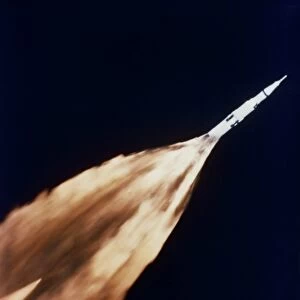 Apollo 6 spacecraft leaves a fiery trail in the sky after launch