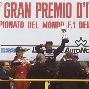 1982 Italian Grand Prix: Rene Arnoux 1st position, Patrick Tambay 2nd position and Mario Andretti 3rd position on the podium