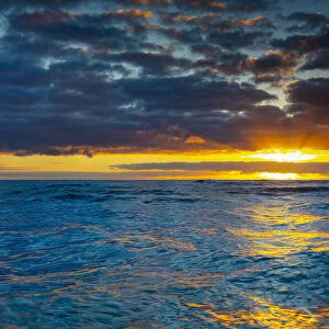 Bright sunrise over ocean, Kauai, Hawaii, USA