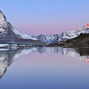 Matterhorn reflected in Lake Riffelsee at Dawn, Zermatt, Alps, Valais, Switzerland