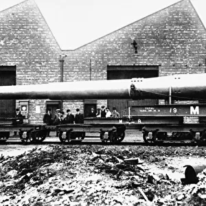 A 15 Naval gun is loaded on to a waiting train at The Royal Ordnance Works at Stoney
