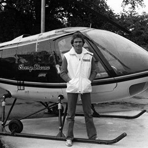 Barry Sheene with his private helicopter at home 1981