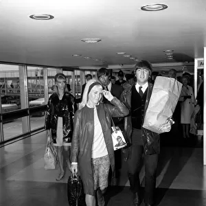 The Beatles 26 May 1964 Two of The Beatles arrive at back at London Airport