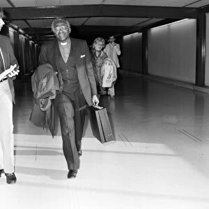 Bishop Desmond Tutu en route from South Africa to Vancouver at Heathrow Airport