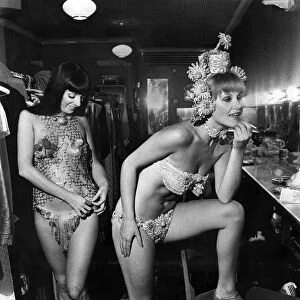 Two cabaret girls put theor make up on before going on stage. August 1975 P012715