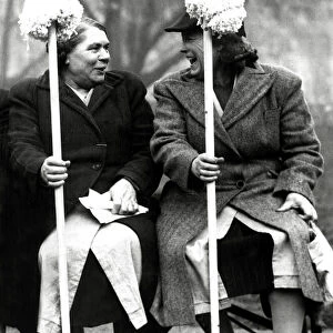 Char-Women holding their mops. February 1949