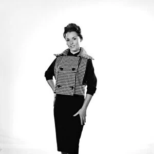 Clothing: Fashion: Jacket: Woman wearing check jacket. Model: Barbara Parry. 1959 B1116