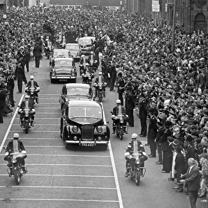 Crowds of fans outside the ABC theatre as the Beatles arrive for the Northrn premiere of