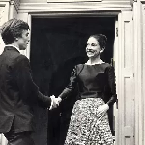Dame Margot Fonteyn says goodbye to Rudolph Nureyev at the door of her Hammersmith home