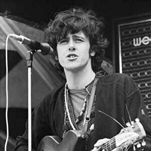 Donovan performing on stage at the 1967 National Jazz and Blues Festival at Royal