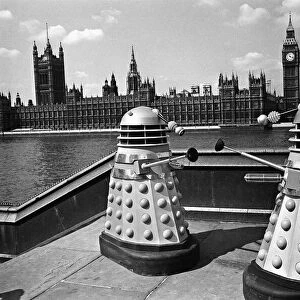 The filming of Dr Who - Daleks characters across the river from Big Ben