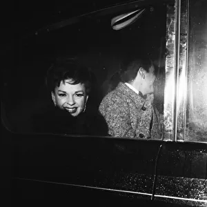 Judy Garland and her daughter Liza Minelli drive away from Covent Garden opera house with