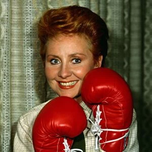 Lulu wearing boxing gloves February 1982