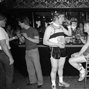 Marathon runners at the London Marathon May 1982 having a break in a pub