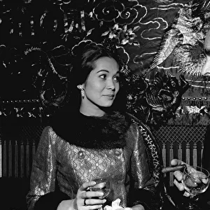 Premiere of the Flower Drum Song with actress Nancy Kwan arriving