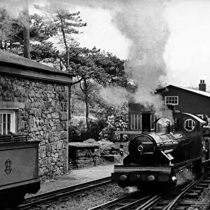 One of the scheduled services sets off on the Eskdale miniature railway on 26 May 1976