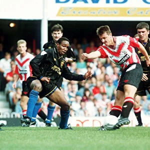 Southampton footballer Matthew Le Tissier on the ball faced by Paul Ince during their
