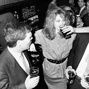 Yuppies Drinking pints of beer at a pub. January 1986