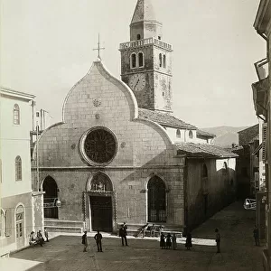 The facade and bell tower of the Cathedral of St. Giovanni e Paolo in Piazza Marconi, Muggia, province of Trieste