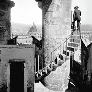 Staircase of the tower of Arnolfo in Palazzo Vecchio and view of the Cathedral, Florence