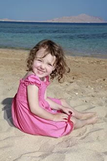 Model released child on summer beach holiday