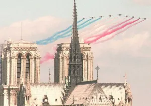 Alphajet planes of the Patrouille de France fly next to Notre Dame Alphajet planes of the Patrouille de France fly next to Notre Dame
