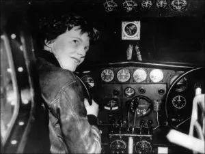 Amelia Earhart at the controls of her plane Amelia Earhart at the controls of her plane