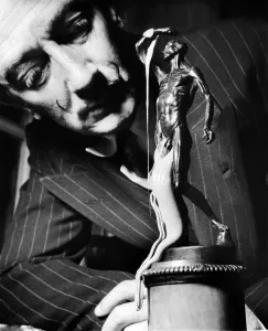 <b class=qtipBold><figcaption>art-artist-DALI</figcaption></b><br>Picture taken in the 50's of Spanish painter Salvador Dali, one of the most popular painters of the 20th century, looking at his masterpiece. Salvador Dali was born in 1904 in Figueras and died 23 January 1989, aged 85. / AFP PHOTO / -<br><em>© Copyright Agence France-Presse (AFP) - All Rights Reserved</em> art-artist-DALI