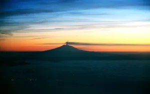 Smoke Prints: Ash clouds spewing from volcano Mount Etna