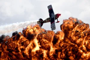 <b class=qtipBold><figcaption>Australia-Aviation-Airshow</figcaption></b><br>A member of the Tinstix of Dynamite aerobatics team flies in front of a wall of fire during the Australian International Airshow in Melbourne on March 5, 2017. The annual event sees 180, 000 visitors over the 3-day public event held at the Avalon Airfield some 80kms south-west of Melbourne. / AFP PHOTO / MAL FAIRCLOUGH<br><em>© Copyright Agence France-Presse (AFP) - All Rights Reserved</em> Australia-Aviation-Airshow