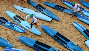 <b class=qtipBold><figcaption>Australia-Lifestyle-Lifesaving</figcaption></b><br>Lifestyle-Australia-lifesaving, FEATURE by Madeleine Coorey Two young boys make their way across lifesaving boards as they participate in what is called a surf lifesaving school for Aussie kids, on Sydney's Cogee Beach on October 14, 2012. In a country known for its laid-back lifestyle and expansive sandy beaches, surf lifesaving is the biggest volunteer organisation with more than 150, 000 members -- of which the five to 13-year-old "nippers" make up about 40 percent. The children gain experience and confidence in the surf and learn about the dangers of the coast, such as the rip currents which pull swimmers out from the beach and can be a major worry for lifesavers, and first aid. AFP PHOTO/William WEST / AFP PHOTO / WILLIAM WEST<br><em>© Copyright Agence France-Presse (AFP) - All Rights Reserved</em> Australia-Lifestyle-Lifesaving