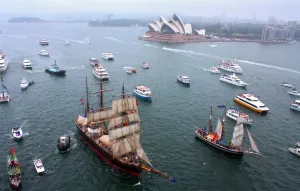 <b class=qtipBold><figcaption>Australia-National Day</figcaption></b><br>Tall ships parade the length of Sydney Harbour past the Opera House (back L) to mark the annual Australia Day celebrations in Sydney on January 26, 2011. Australia used its national holiday on January 26 to call for Britain to hand over a map drawn by explorer Matthew Flinders in 1804 that depicted the vast continent under its modern name for the first time. AFP PHOTO / DRINA THURSTON / AFP PHOTO / DRINA THURSTON<br><em>© DRINA THURSTON</em> Australia-National Day