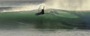 <b class=qtipBold><figcaption>Australia-Tourism-Surfing</figcaption></b><br>A surfboard rider glides across the face of a wave at Injidup Beach in the world-renowned surfing area of the south-west corner of Western Australia in this photo taken on May 10, 2011. The legendary coastline with its amazing surf breaks, spans an area between Cape Naturaliste and Cape Leeuwin and is also famous for its premium wine growing, pristine white sandy beaches and spectacular forest scenery. AFP PHOTO / Greg WOOD / AFP PHOTO / GREG WOOD<br><em>© Copyright Agence France-Presse (AFP) - All Rights Reserved</em> Australia-Tourism-Surfing
