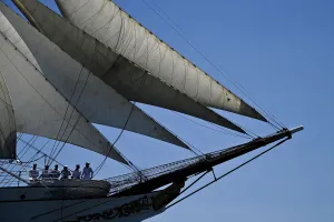 Tall Ship Prints: Crew members of Portuguese sailing boat Sagres sail in Tejo River in Lisbon on July 19