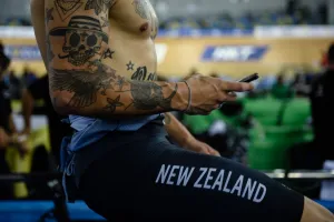 <b class=qtipBold><figcaption>Cycling-Hkg-World-Track</figcaption></b><br>A member of New Zealand's cycling team uses his phone as he warms up at the 2017 Track Cycling World Championships in Hong Kong on April 12, 2017. / AFP PHOTO / Anthony WALLACE<br><em>© Copyright Agence France-Presse (AFP) - All Rights Reserved</em> Cycling-Hkg-World-Track