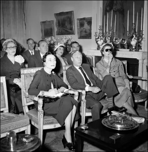 Duke Edward of Windsor and Duchess Wallis of Windsor watch the transmission of the coronation of Queen Elizabeth II