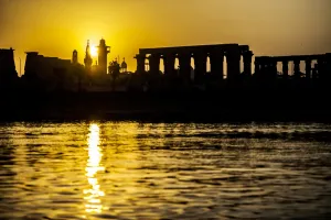 <b class=qtipBold><figcaption>Egypt-Nile-Feature</figcaption></b><br>A picture taken on September 10, 2017 shows a silhouette of the skyline of the southern Egyptian city of Luxor at sunrise, showing the pylons and columns of the ancient Egyptian Temple of Luxor and the minaret of the 13th century Abu Haggag mosque, with the belltowers of the Coptic Orthodox Church of the Archangel Michael appearing in the background. / AFP PHOTO / KHALED DESOUKI<br><em>© Copyright Agence France-Presse (AFP) - All Rights Reserved</em> Egypt-Nile-Feature